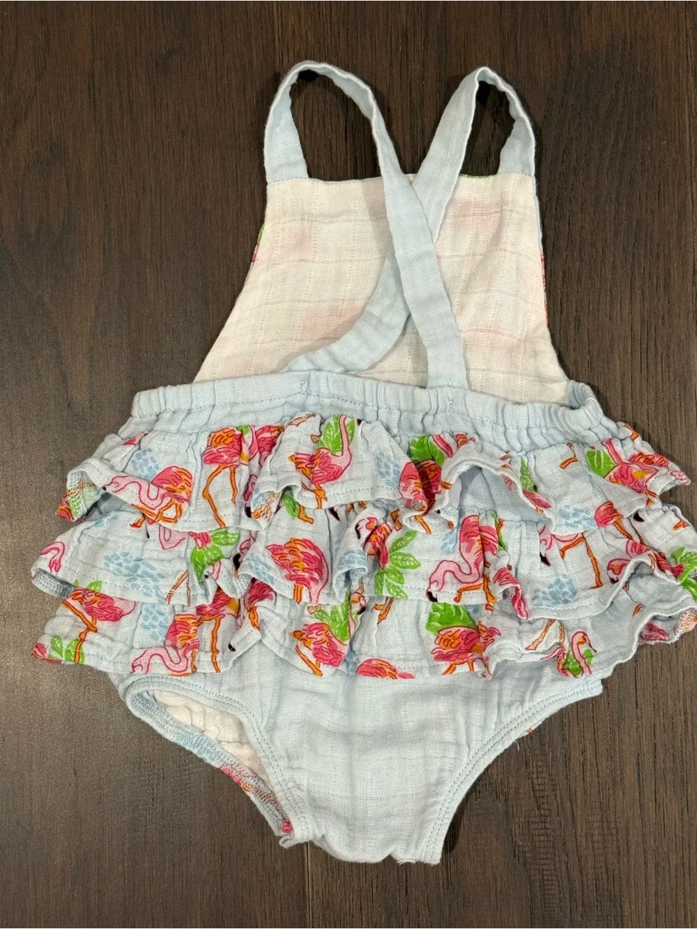 MudPie 6-9 month flamingo ruffle romper with cross cross back